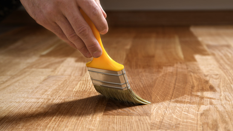 Applying finish to hardwood floor