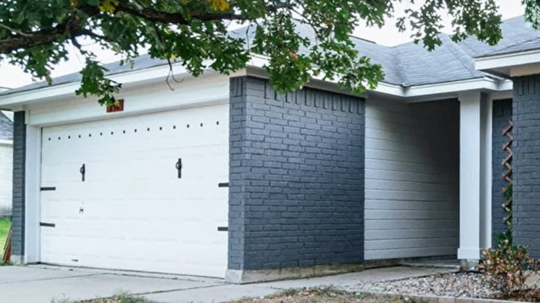 gray brick house with white