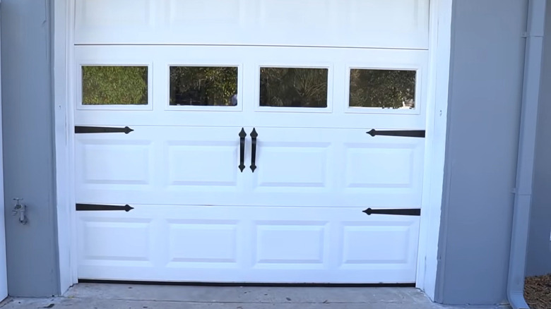 black accents on white door