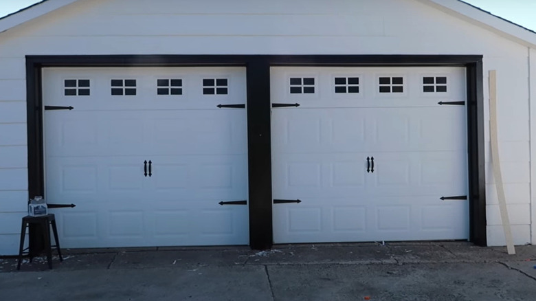 white garage doors with black