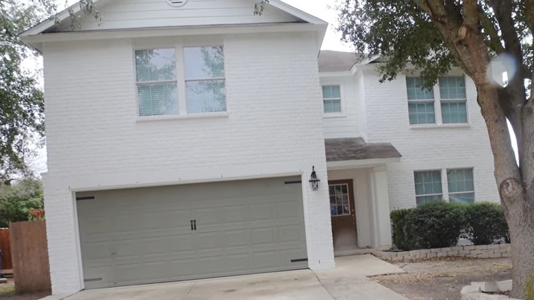 taupe garage door with decals