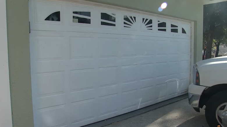 small arched windows on garage