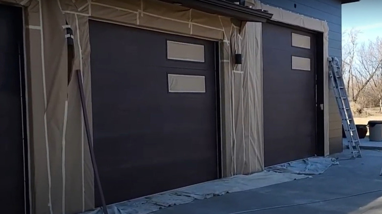 garage doors surrounded by cloths