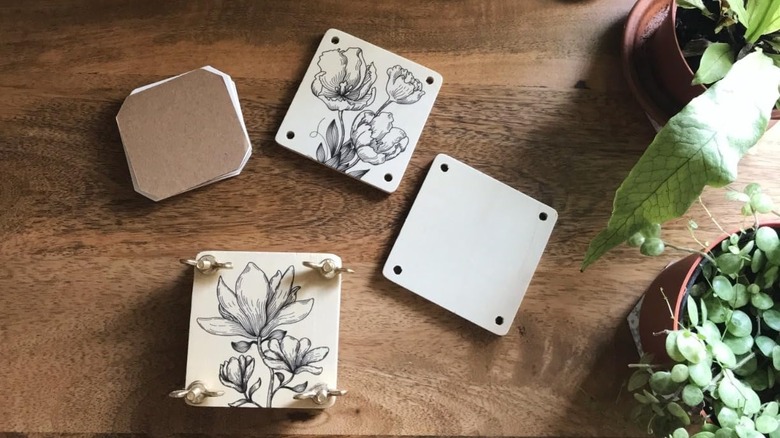 Flower press components on a table for crafting