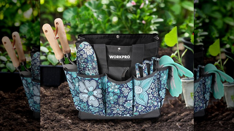 Garden tool bag with matching tool set in a garden