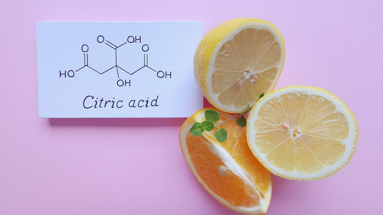 Lemons beside formula for citric acid