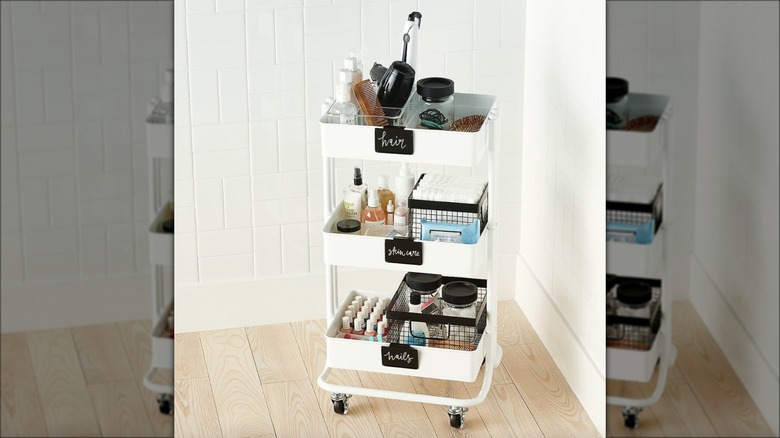 white cart with toiletries