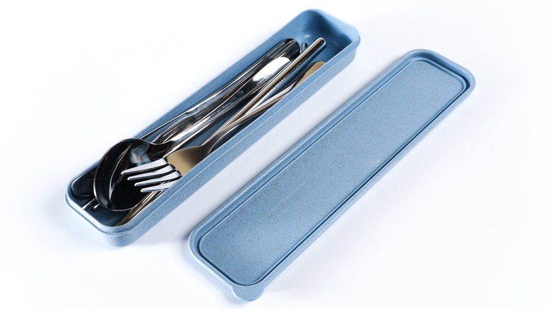 silverware in plastic holder