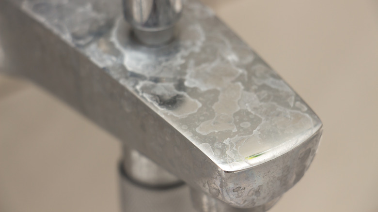 hard water stains faucet up-close