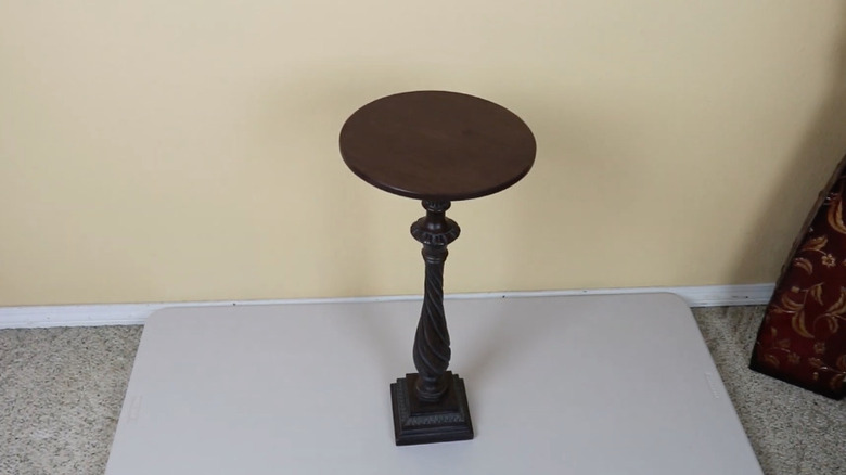 Small table made from an old lamp