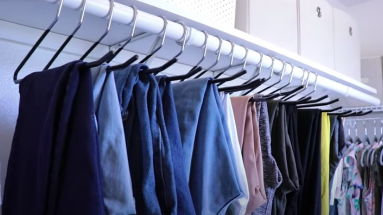 Organized pants in a closet