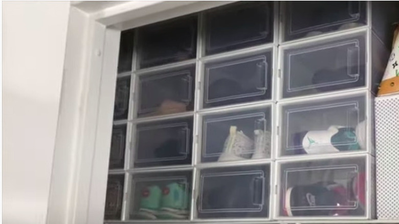 Shoes stacked in closet