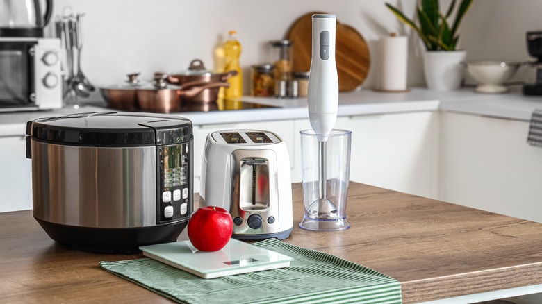 toaster and crock pot on the counter