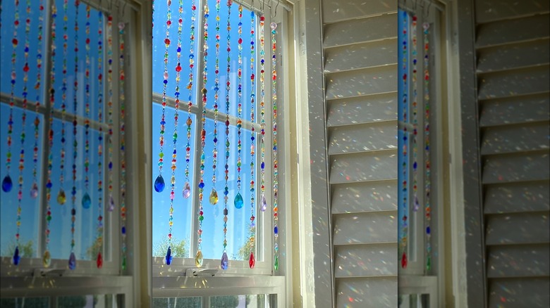 beaded jewels hanging on window