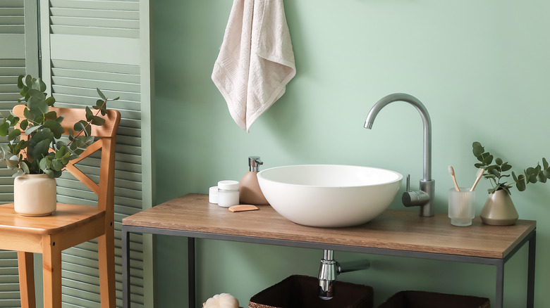 minimalistic light green bathroom