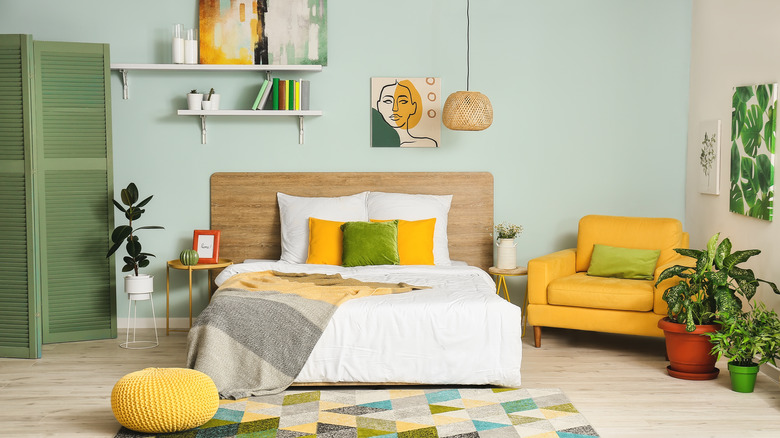 minty bedroom with yellow accents
