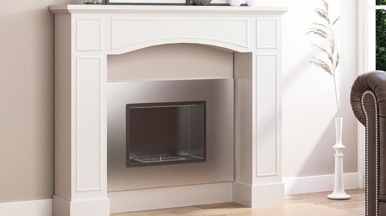 white decorative fireplace mantel