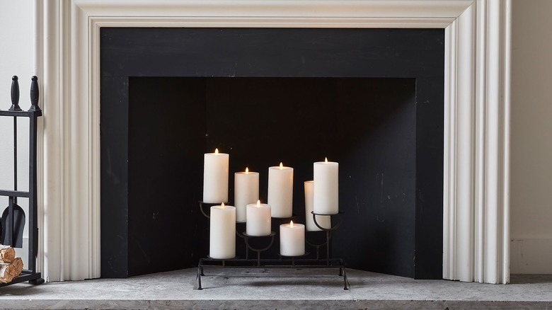 candle holder in fireplace