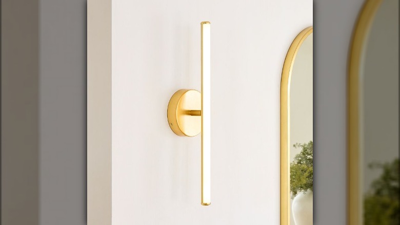 Gold bar wall sconce