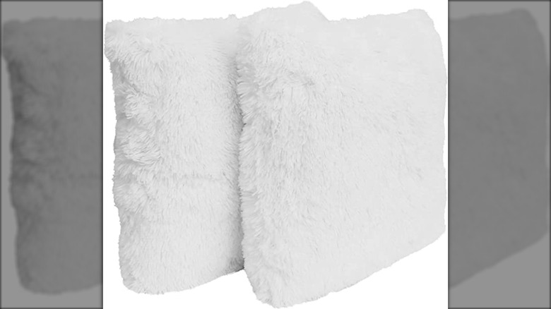 White faux fur throw pillows