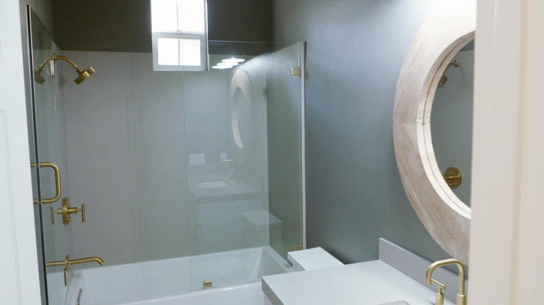 Bathroom with gold accents