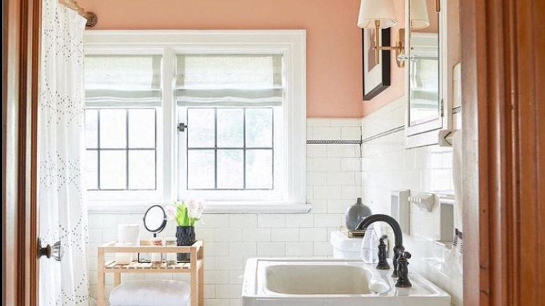 Blush bathroom with subway tile