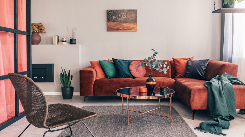 Velvet sectional with throw pillows