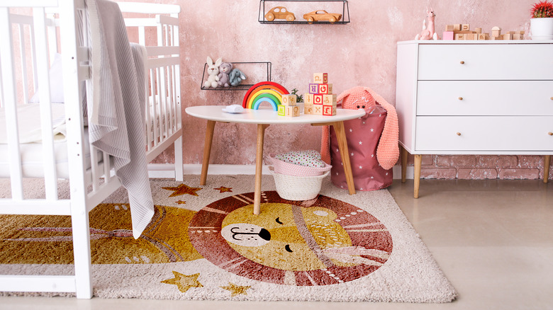 pink bedroom with lion rug