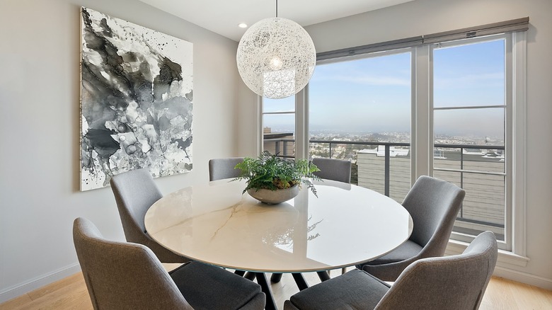 Round marble table with chairs