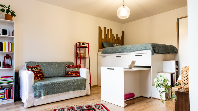 Bed lofted on dresser