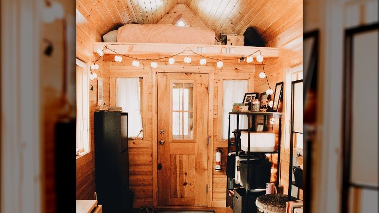 Tiny house attic loft bed