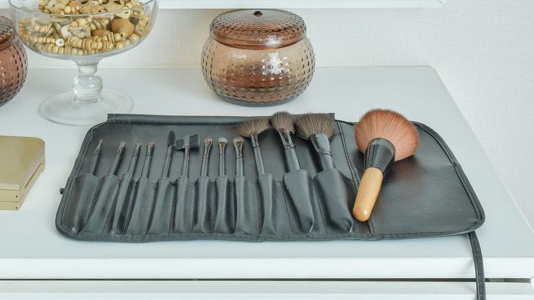 makeup brushes in a holder