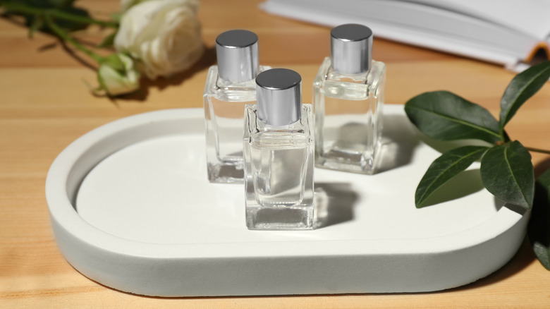 perfume bottles on a tray