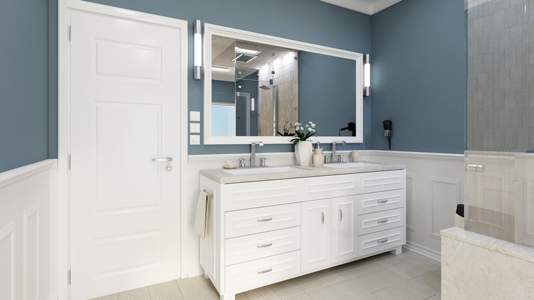 Dark blue and white bathroom