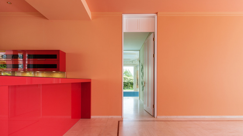 coral ceiling in red kitchen