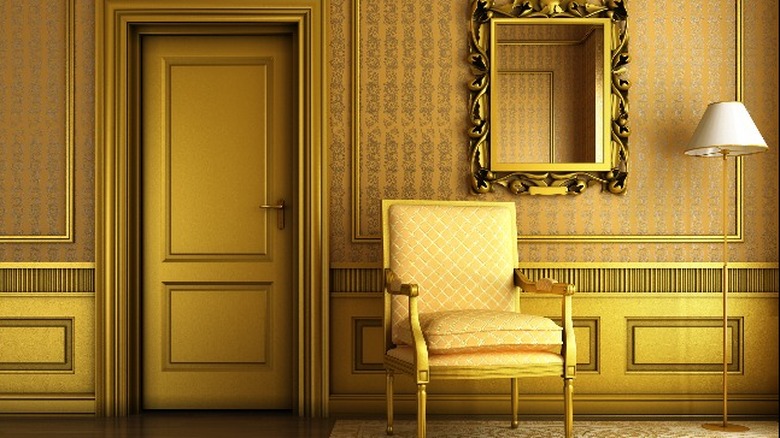 Rich gold room with chair