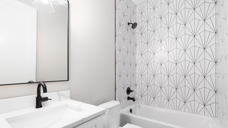 geometric pattern on shower tiles