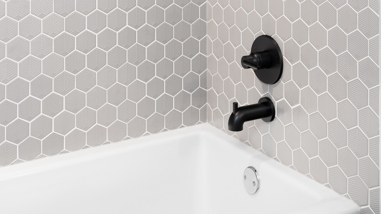 bathtub with hexagon tiles