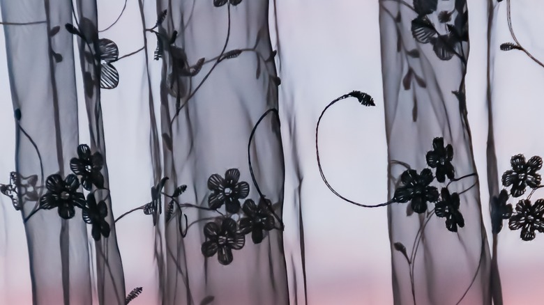 Black sheer curtains with flowers