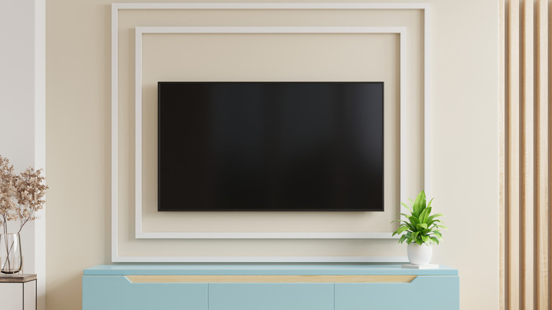 television surrounded in white trim