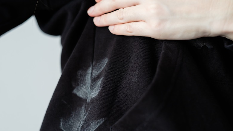 deodorant marks on black shirt