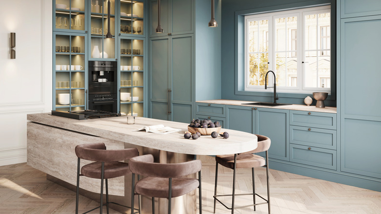 A curved kitchen island with circular seating