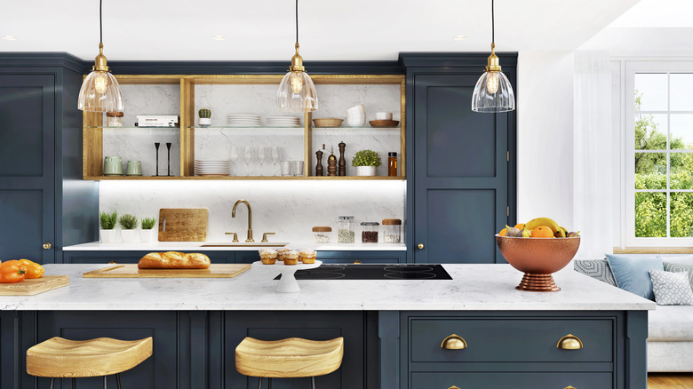 Embellished navy cabinets in a modern kitchen island