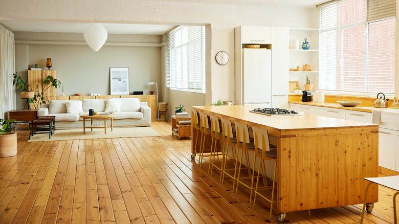 Kitchen with a wood island on wheels