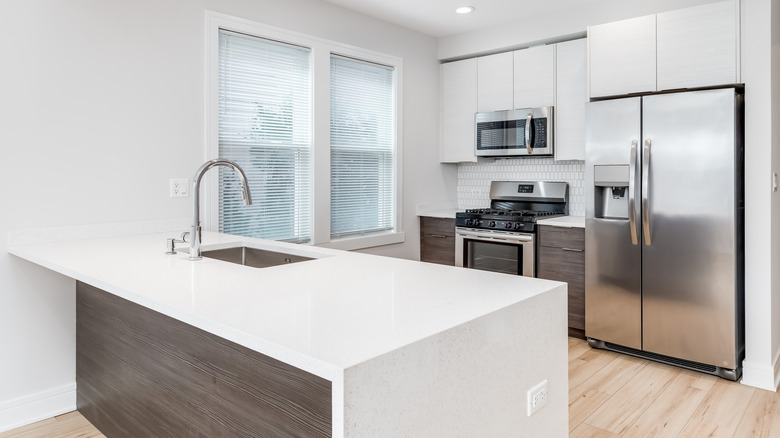 Kitchen island with a waterfall countertop