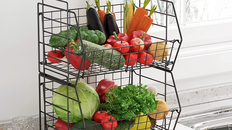 Black metal crates with produce