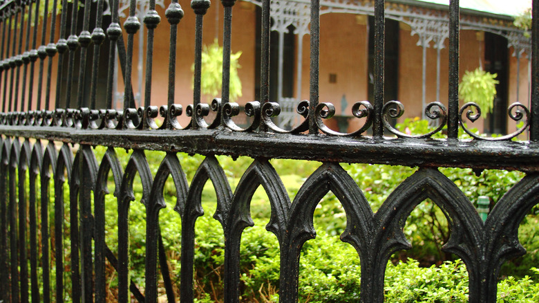 black iron gothic arch fence