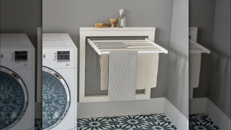 Cream colored wall-mounted drying rack