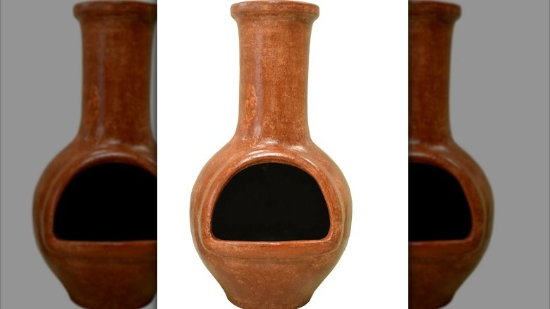 Small orange clay chiminea