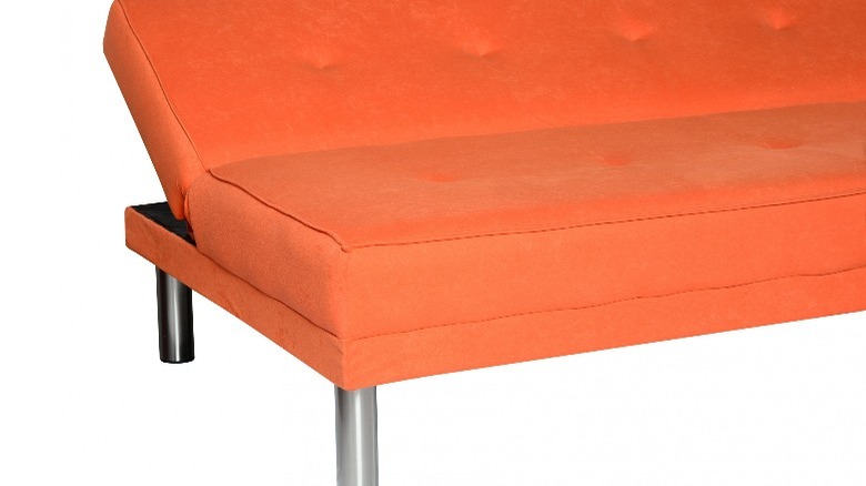 Bright orange futon